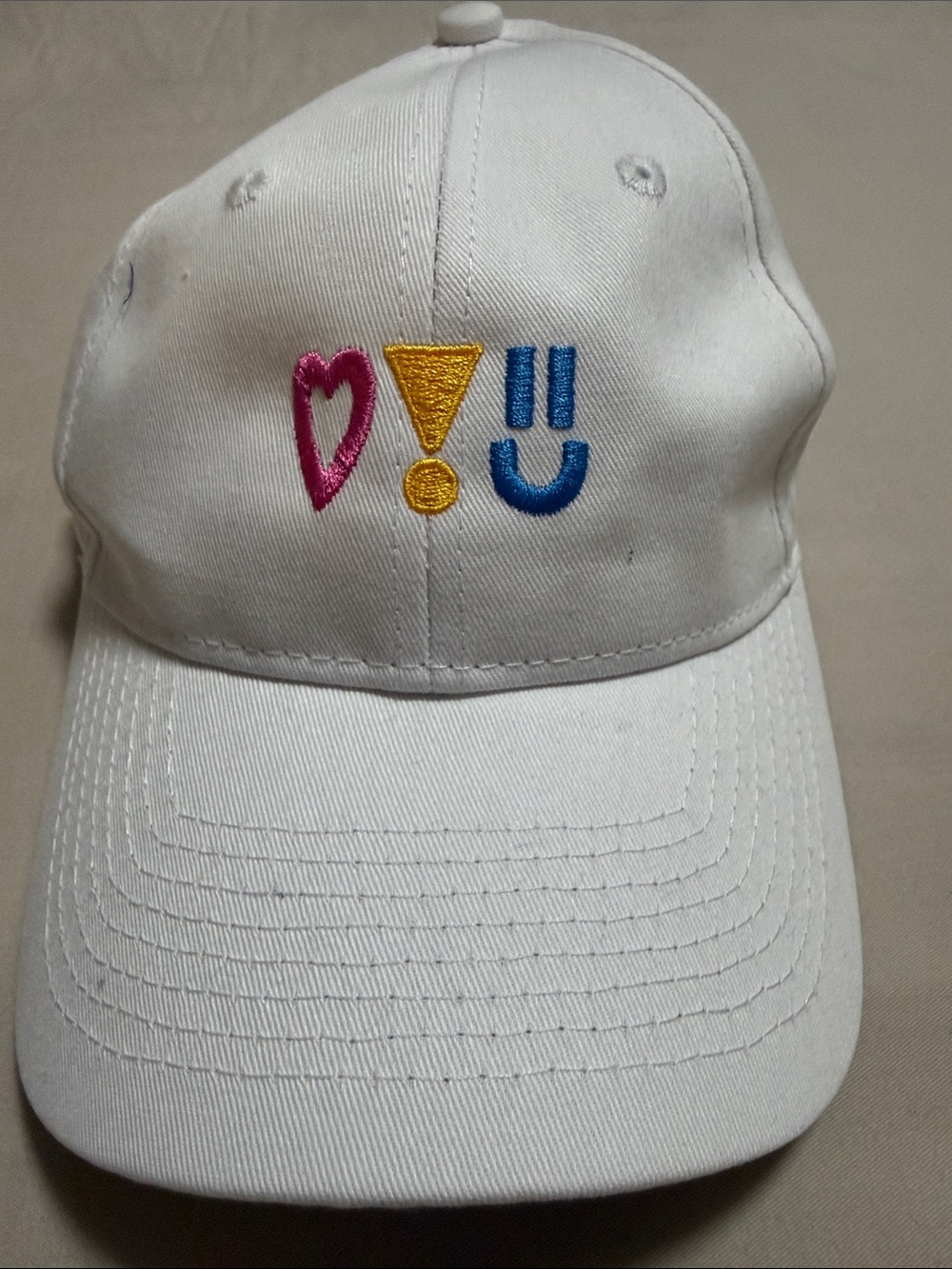 White Baseball Cap with Pink Heart, Yellow Exclamation & Blue Smile Embroidery